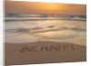 Sand writing on beach by Assaf Frank